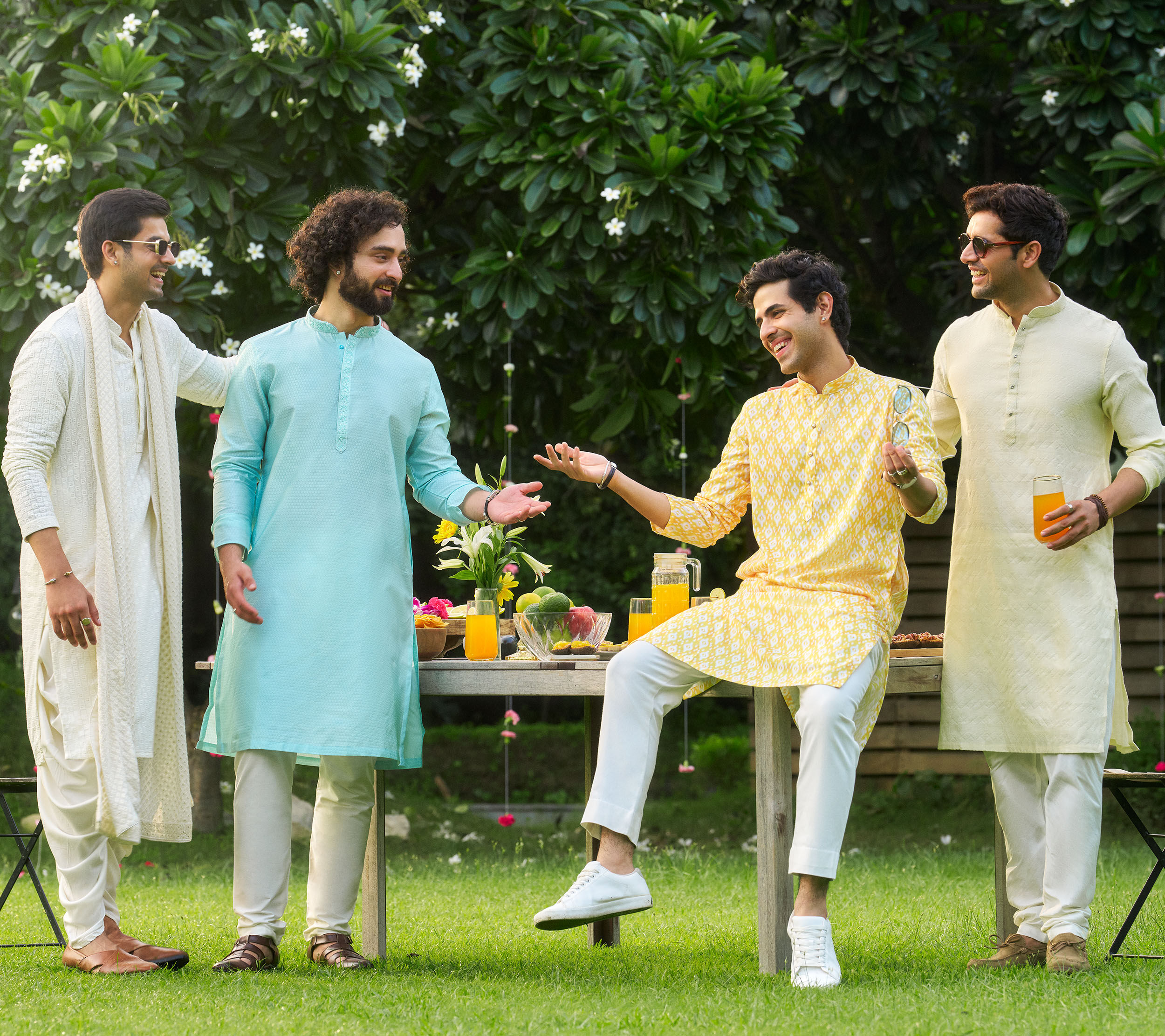 Men in pastel kurtas showcase ethnic styling with relaxed silhouettes, contemporary colors, and effortless festive elegance.
